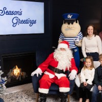 Louie the Laker, Mom, Dad, Santa, little girl, and little boy